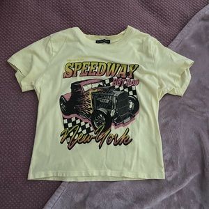 Brandy Melville yellow Speedway cropped shirt